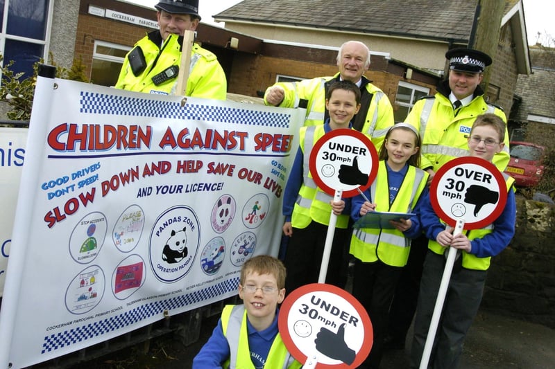 Cockerham School pupils, Sam Atkinson, Matthew Barton, Lucy Ibison and Robert Brayfield, with PC Peter McHugh, PC Andy Benn and Will Hall promoting their new road safety campaign.