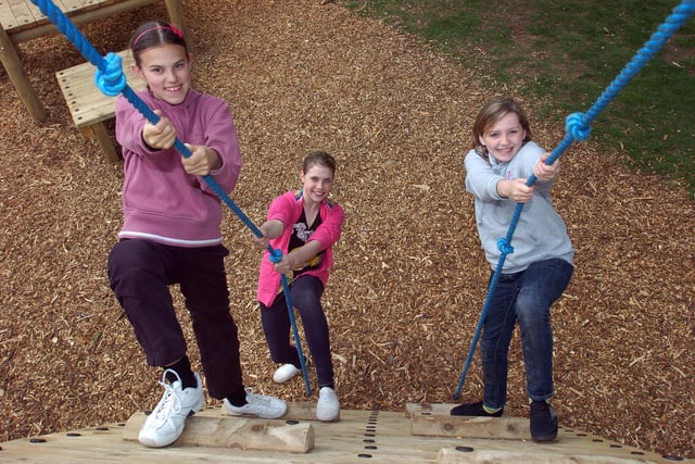 Pupils from Morecambe High School, Niamh Whiteside, Hayley Stubbs and Paige Clark try out the new Natural Adventure Play Area in Happy Mount Park.