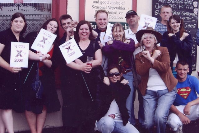 X-Factor contestants Trish (fourth from left) and Shauna (wearing cowboy hat), from the Victoria Pub in Fleetwood, with colleagues and friends