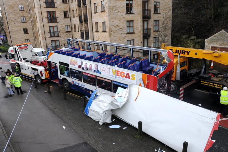 The scene on St George's Quay after a double decker bus tried to pass underneath Damside Bridge, losing most of its roof in the process. Fortunately, no one was injured.