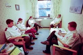 A staff change over meeting on ward 23 at the RLI in 2000. Photo by DJ Clark.