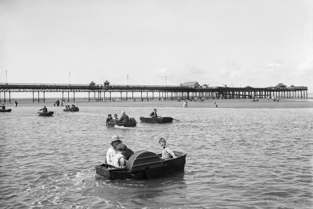 View of West End Pier in Morecambe from across the Children's Boating Pool in 1925-30.