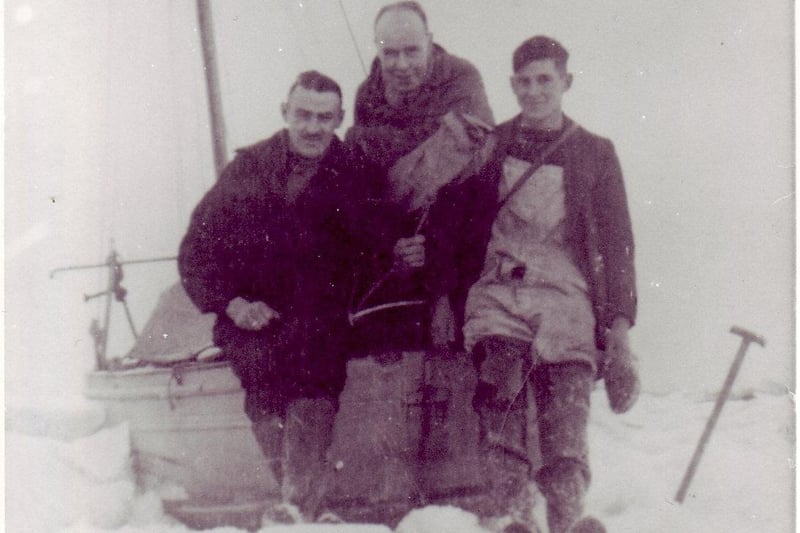 Roger Dugdale took this photo of some pals by his boat, which was on a six foot block of ice and snow in low tide in Morecambe Bay in January 1940.