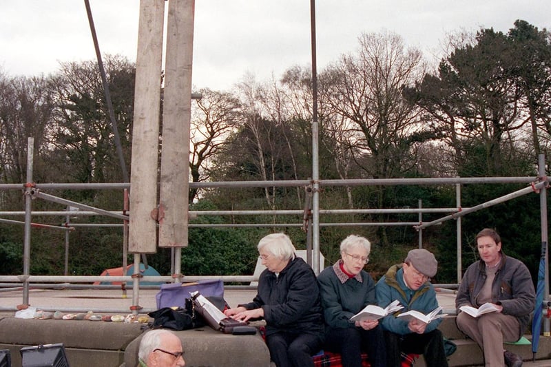 Members of the Wesley Methodist Church holding an Easter vigil in Lancaster's Williamson Park which lasted from 7pm on Good Friday until 6.30 am on Easter Sunday. 220400-8. (2000). Picture by Garth Hamer.