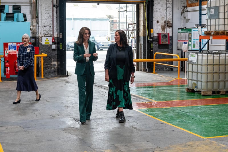 Catherine, Princess of Wales speaks with Emma Douglas, creative and commercial director of manufacturing, whilst visiting Standfast and Barracks.