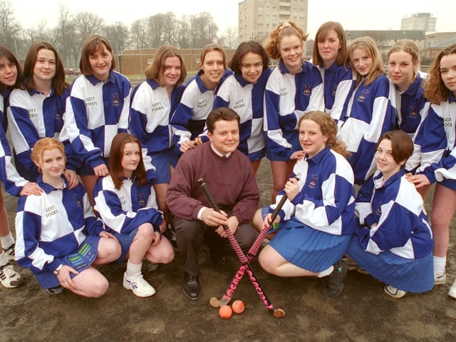 Mark Gould, financial director with Gott Foods, Morecambe, pictured with the Our Lady's High School, Lancaster, senior girls hockey team, who his company have donated a set of hockey strips to. Included in the group is team captain Emily Procter (front, second from right).
