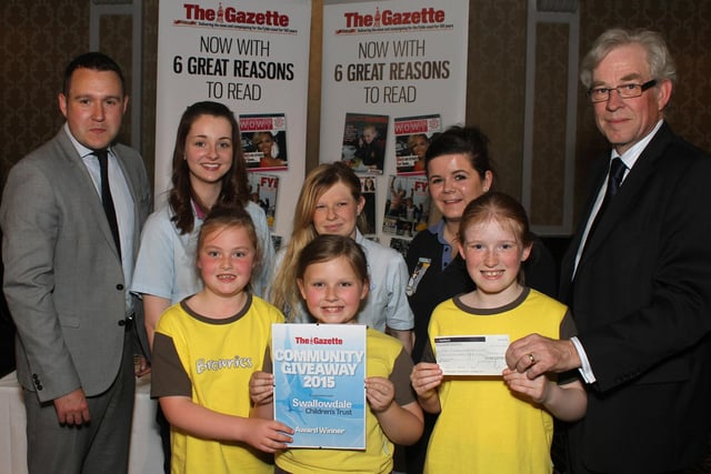 Community Giveaway 2015 by Swallowdale Children's Turst in association with The Blackpool Gazette at The Imperial Hotel. Pictured is Gazette deputy editor Andy Sykes and chairman of Swallowdale Children's Trust, with Community Giveaway winners - the 15th Fleetwood Brownies