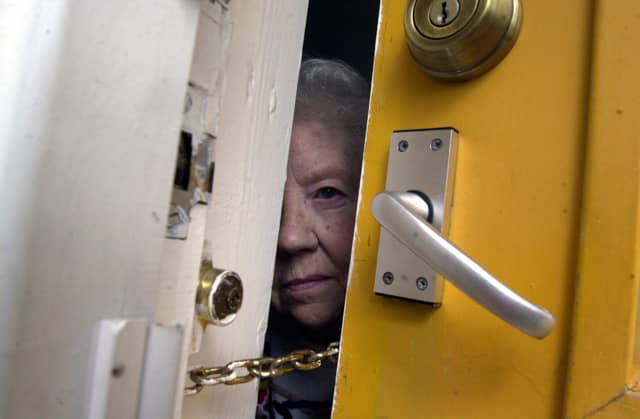 Police have issued a warning after a suspected bogus caller tried to gain entry to a house in Lancaster.