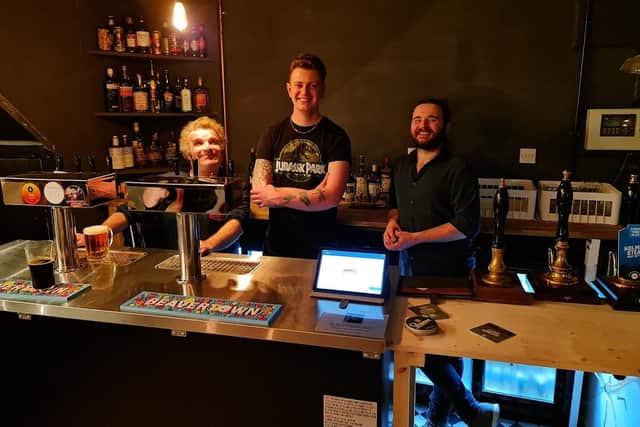 Inside Jimmy's Taphouse, with (from left), Jimmy, Milo and Tom, pictured during last Saturday's test opening.