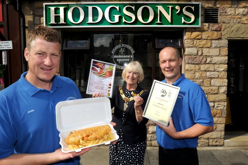 The Mayor of Lancaster Coun June Ashworth with owner of Hodgson's Chippy, Nigel Hodgson (left) and shop manager Paul Eden. The fish and chip shop on Prospect Street in Lancaster received a certificate of achievement from Taste Lancashire for highest quality assured and another certificate from Fry Magazine for getting in their Best 50 Fish and Chip Shops 2013.