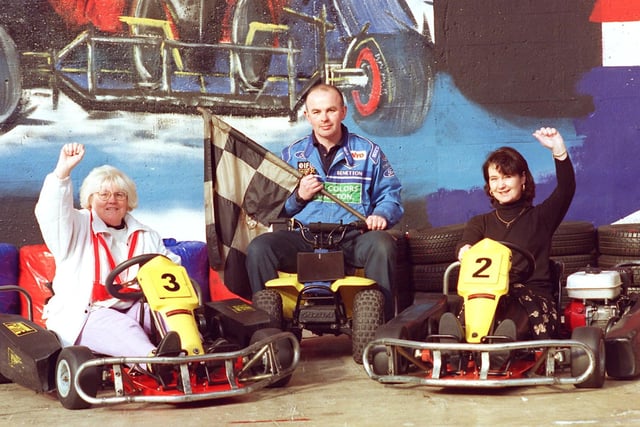 Councillor Jean Yates at the Heysham Go Karting track with owners Stephen and Jackie Spavin, 1997.