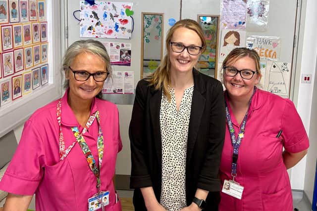 Cat with Play Specialists, Rebecca Harvey (right) and Ania Barska at the Children’s Ward