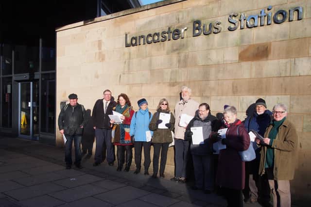 Lancaster Bus Users' Group giving out leaflets at the bus station.