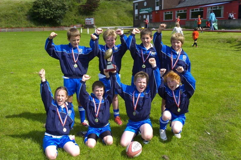 Bolton-le-Sands CE Primary School celebrate their win at a Vale of Lune Tag Rugby Festival.