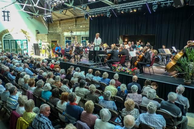 An aerial view of Morecambe Promenade Concert Orchestra performing at The Platform in Morecambe.