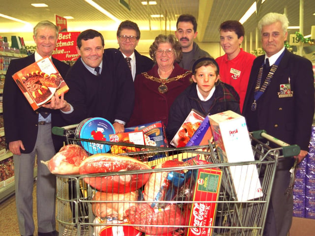 Winner of Lancaster and Morecambe Lions Club trolley dash competition, Carl Lis of Ingleton (second left) who collected goods totalling £397 during his dash around  the Lancaster Asda store, witnessed by  his daughter Amy, the Mayor of Lancaster, Coun Janet Horner, Lions Club president Keith Watson and his wife Kathleen, club members Mike Sidebotham and Joe Pearson, competition runner up Mark Neill and Asda customer service manager Linda Rogerson.