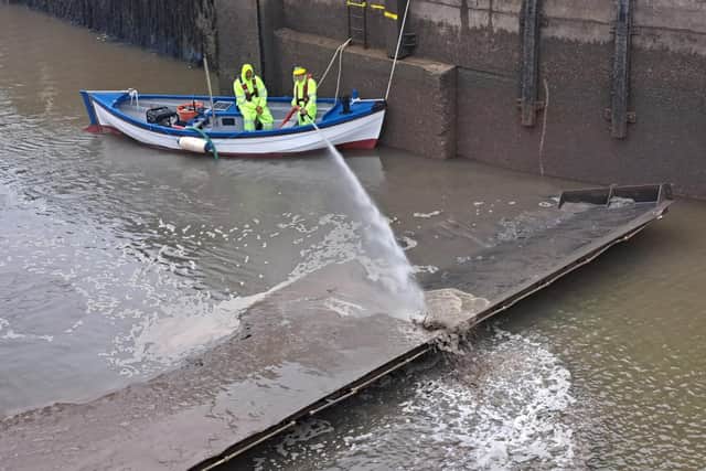 Originally used for fishing, the shallow, wide design means it is ideal for jobs in the port today, like power washing silt off the dock gate.
