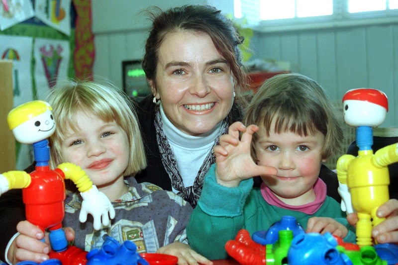 Nancy Kent and Yasmine Stafford enjoy themselves playing at St Martins Pre School Centre, Moorgate, Lancaster, with early years specalist teacher Zita Keane.