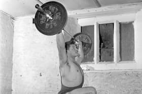 A weightlifter (shame gym outfits like this have gone out of fashion)