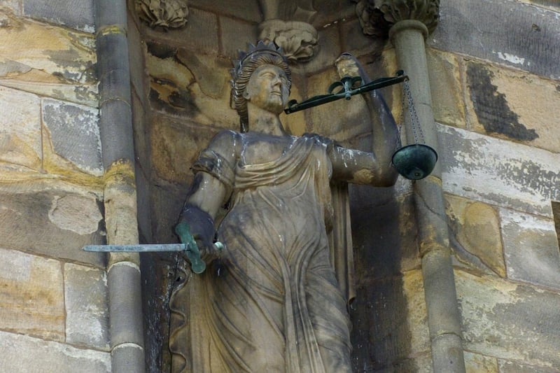 Scales of Justice statue in the main courtyard.