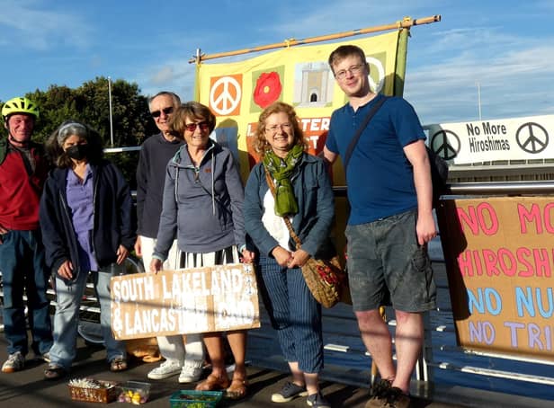 Supporters of the Campaign for Nuclear Disarmament gathered on Millenium Bridge in Lancaster on Saturday evening.