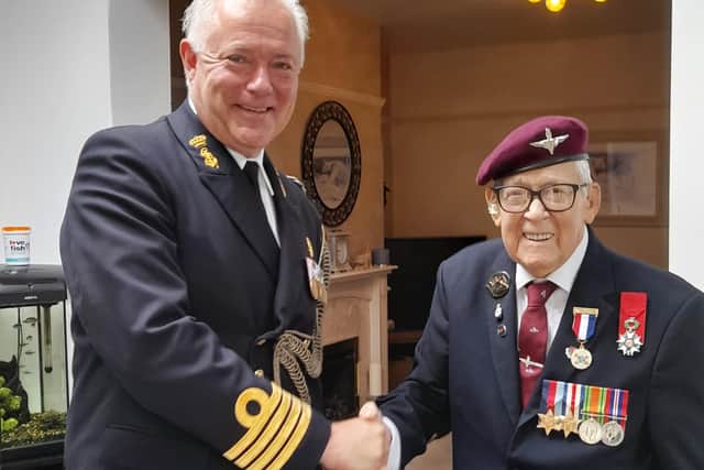 Captain Gerrit Nijenhuis with Jack Bracewell after presenting him with a Dutch Liberation medal and certificate. Photo: Kelvin Stuttard