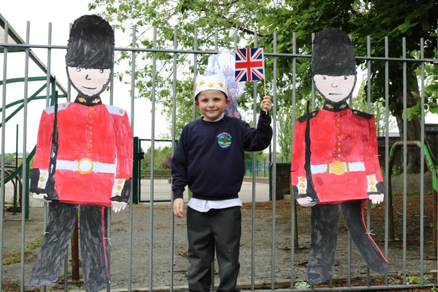 Stepping Stones Primary pupil referral unit held a Jubilee Lunch and open afternoon, with children, staff and parents/carers joining in for tea and cakes before going into the classrooms to look at children's work. Pictured with the beefeaters is Freddie Tinker.