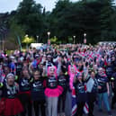 Cheering crowds at a St John's Hospice Moonlight Walk in Lancaster.