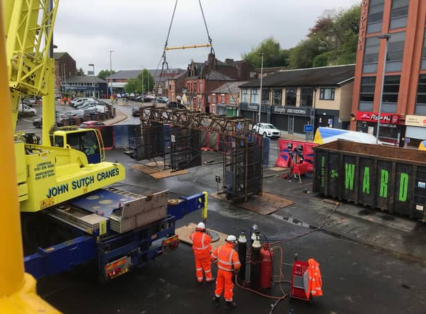 Old signalling gantry lifted out by crane near Macclesfield as part of the upgrade of the West Coast Main Line