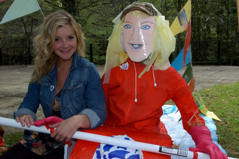 Blue Peter presenter Helen Skelton in 2010 with a scarecrow of herself made by pupils at Ridge Community Primary School of her epic canoe journey down The Amazon.