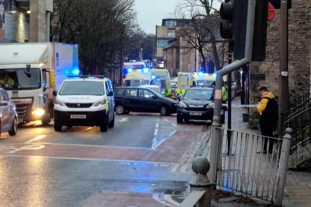 Emergency services at the scene of a collision in Lancaster city centre.