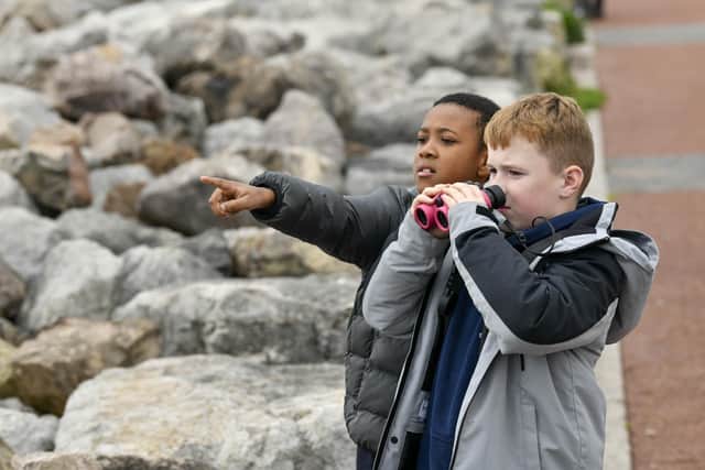 Launch of the Ernest Cook Trust Blue Influencers Scheme. Trust staff were joined on the Stone Jetty in Morecambe by pupils from St Mary's Catholic Primary School in Morecambe to take part in a litter pick and bird watching session. Photo by Stuart Walker Photography 2023