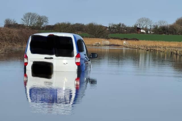 The van stuck in water at Snatchems.