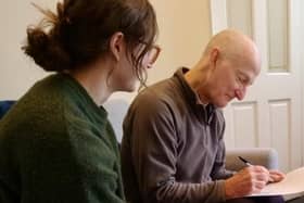 PhD student Seren Parkman interviews Martin Nance as part of the study to assess voice quality across the lifespan.