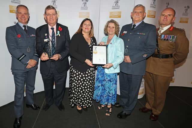 Air Commodore Adam Sansom (far left) and Major General Mark Overton (far right) presenting the award to Coun Roger Dennison, Kirsty Chekansky, Carol Davison and Paul Davison from Lancaster City Council. Picture by Gareth Jones