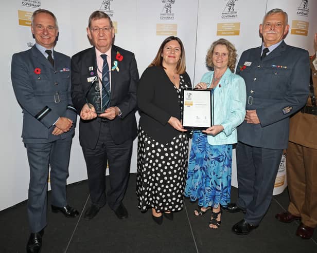 Air Commodore Adam Sansom (far left) and Major General Mark Overton (far right) presenting the award to Coun Roger Dennison, Kirsty Chekansky, Carol Davison and Paul Davison from Lancaster City Council. Picture by Gareth Jones