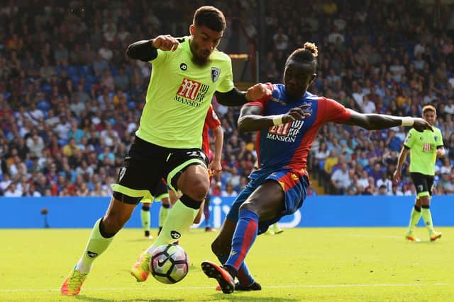 Former Crystal Palace defender Pape Souare (right) has joined Morecambe Picture: Patrik Lundin/Getty Images