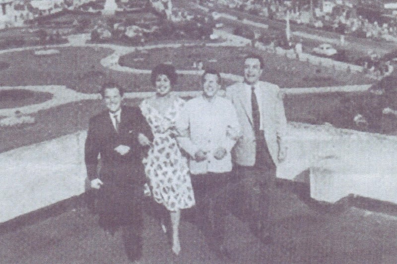 Morecambe and Wise with Alma Cogan and Ken Platt pictured on the seafront in Morecambe. The photo was taken during a break in performances in 1958 when singer Alma actually topped the bill at the Winter Gardens in a summer season, ahead of Eric and Ernie. Ken Platt was also a comedian.