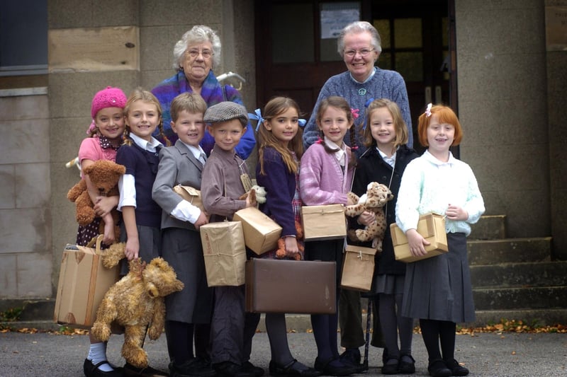 As part of their World War II studies, year 3 from Moorside Primary School were evacuated to Scotforth Parish Hall where they met Mrs Edna Earnshaw, who was evacuated from Liverpool after the family home was bombed and Mrs Margaret Brierley who had evacuees staying with her. Erin Gardener, Issy Keen, Thomas Padfield, Brandon Park, Ella Fogg, Evie Joyram, Ella Johnson and Amy Cashin are pictured with their gas masks, teddies and suitcases.