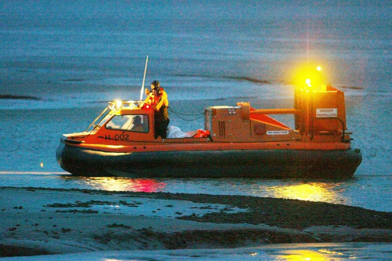 An RNLI hovercraft returns to the shore at Morecambe on February 6, 2004 after a search of the bay.