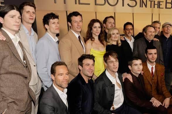 Joel Phillimore (back row, second left) shared this photo of himself at a film premiere in Los Angeles with the cast of The Boys in the Boat and director George Clooney. Photo: Getty Images