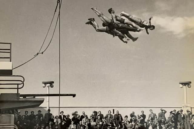 Spectators watched in amazement as five interlocked divers fly through the air from the ten metre board. Photo courtesy of Lancaster Museums Service.