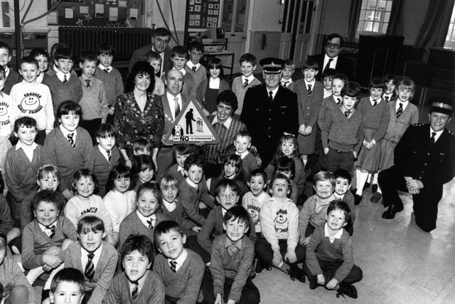 Warning signs about talking to strangers are to be attached to School gates in Fleetwood. Children at Chaucer School, Fleetwood were warned about talking to strangers. They are pictured with the Mayoress of Wyre, Mrs Josephine Ashworth (centre), the Mayor, Coun Charles Ashworth, Mrs Anna Stefani, Chief Superintendent Ken Mackay and (on the right) Chief Inspector Frank Harding in charge of Community Affairs department
