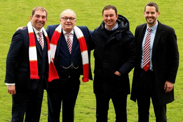 Morecambe co-chairmen Graham Howse and Rod Taylor, manager Derek Adams and director James Wakefield are keeping the club ticking over while it remains up for sale Picture: Michael Williamson