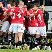Morecambe celebrate their winning goal against Lincoln City last weekend Picture: Michael Williamson