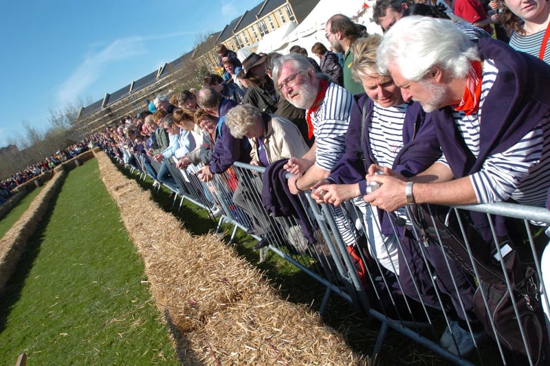 Crowds wait in anticipation for the 12th annual Sedan Chair Race at the Georgian Festival in Lancaster over the Easter weekend.