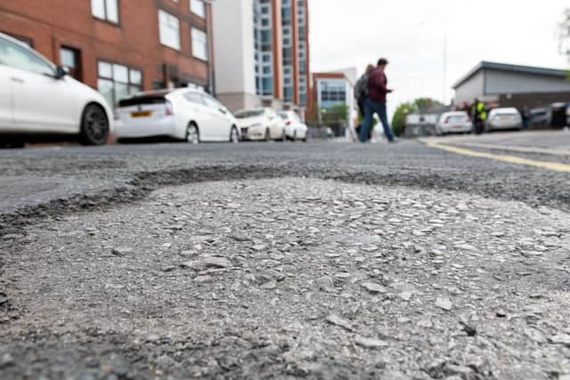 A wet winter has been blamed for Lancashire's pothole explosion