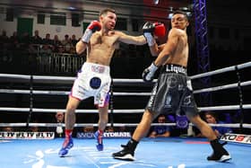 Isaac Lowe, left, in action against Luis Alberto Lopez