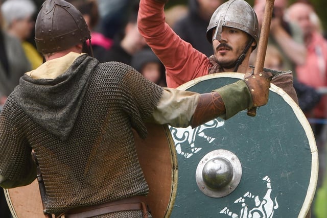 Shields and axes are used in the battle re-enactment at the Viking Festival. Picture by Daniel Martino.
