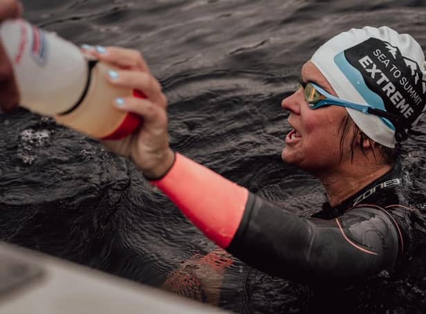 Andrea Mason swam 65km, cycled 800km and ran 44km up three mountains whilst gaining 3400m of height. Credit: Olly Bowman Photography